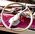 Original(?) style wheel. Note the hub's oval base which matches the outline